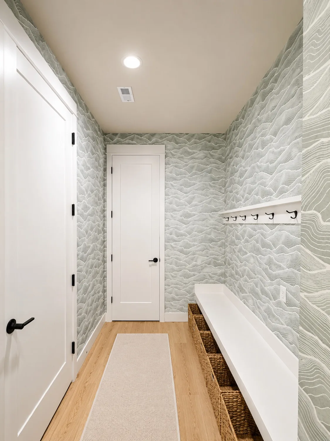 Hands preparing and smoothing a wall surface